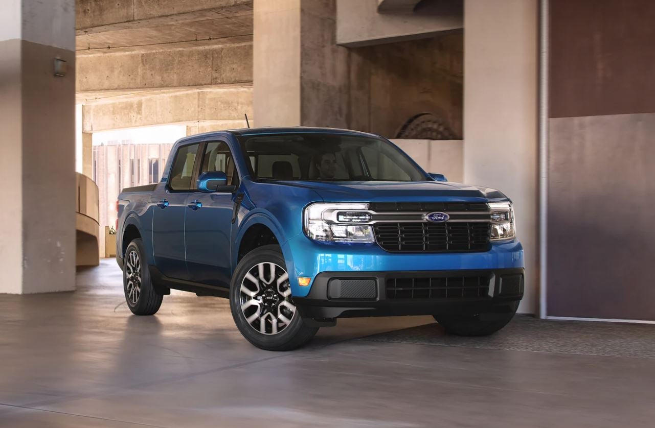 Blue 2022 Ford Maverick Driving Through A Parking Garage