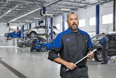 Technician holding tools