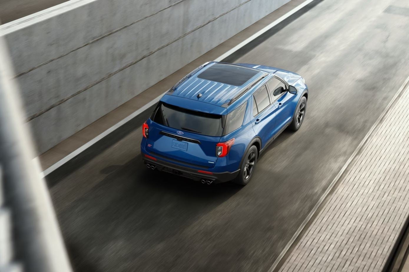 An overhead view of a blue 2023 Ford Explorer ST