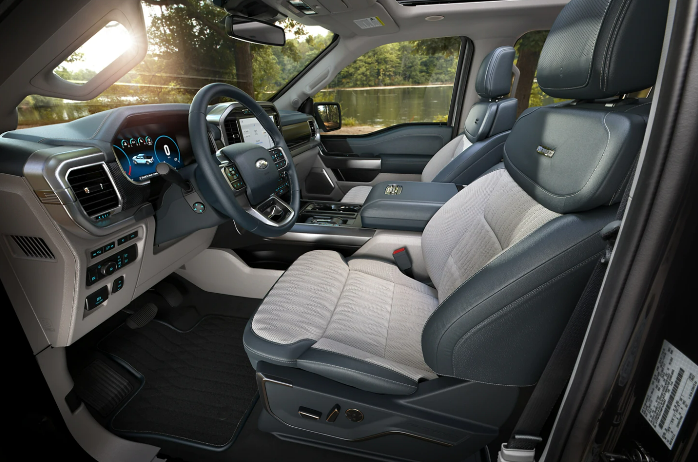 A view of the seating upholstered in two-tone gray leather of a 2023 Ford F-150