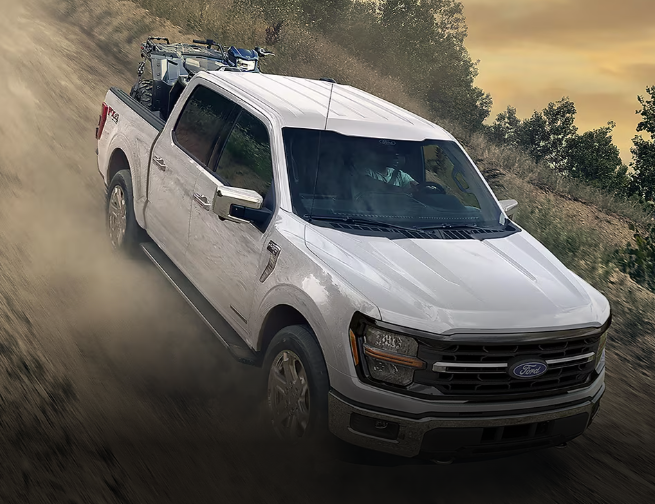 Exterior shot of a red Chevy Silverado parked outdoors.