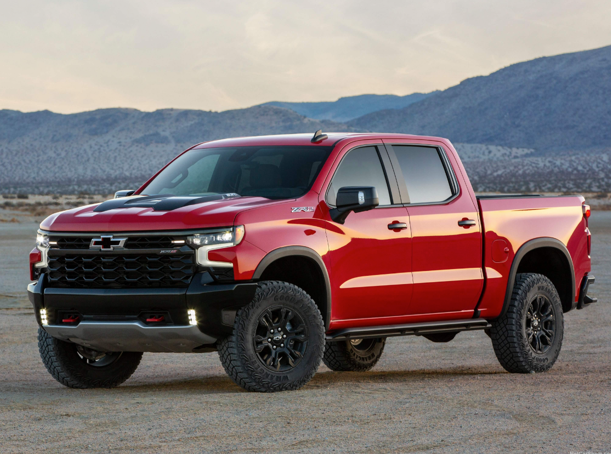 Front view of a silver 2025 Chevy Silverado truck.