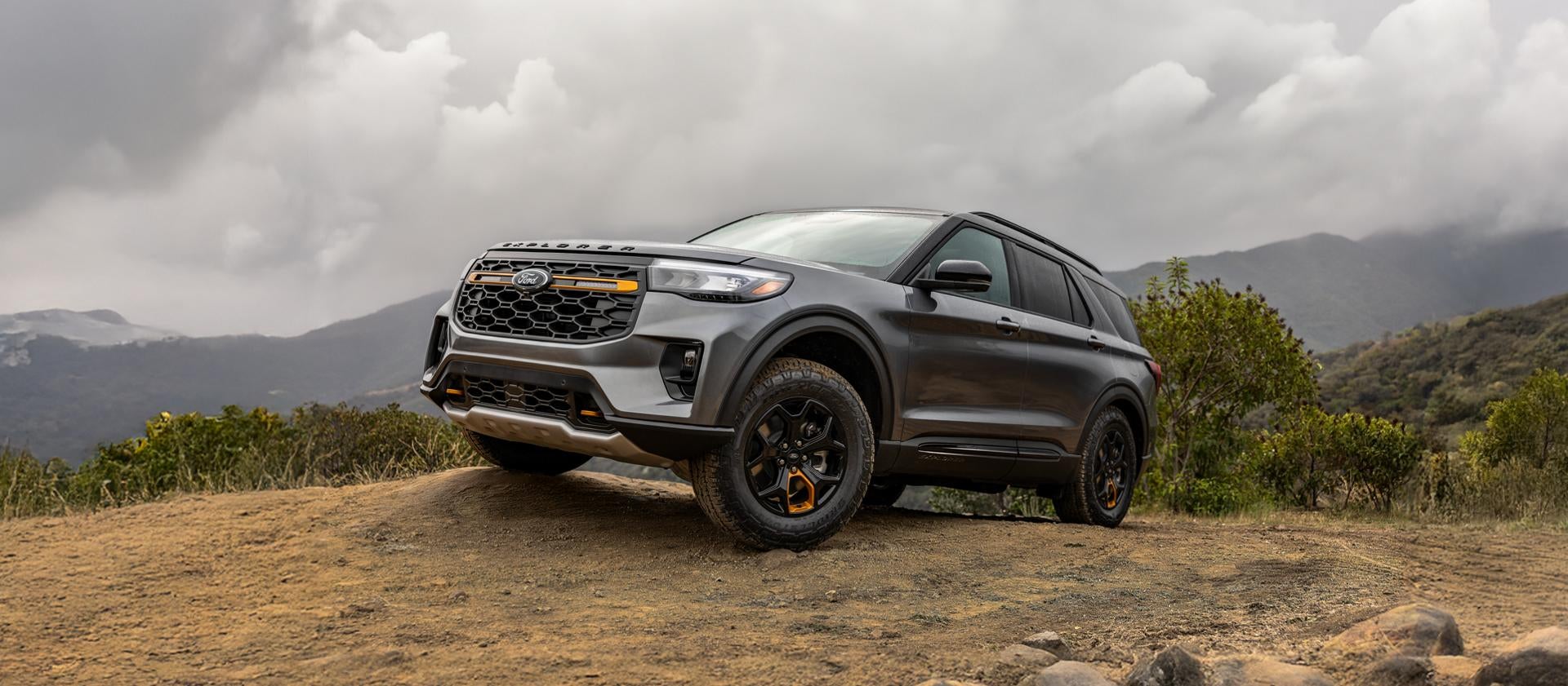 2026 Ford Explorer Tremor off-roading and parked on a large rocky surface