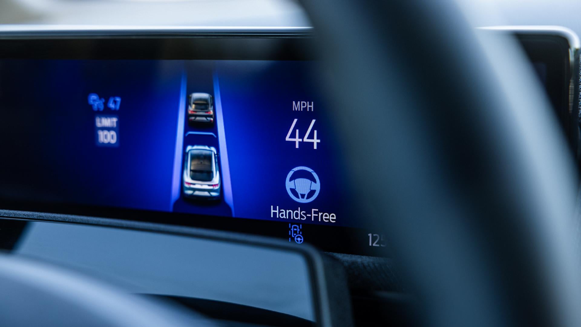 Interior view of Ford Mustang Mach-E digital displays and steering wheel